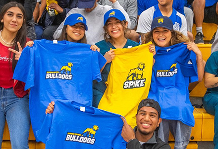 Students at a rally with new Spike shirts.